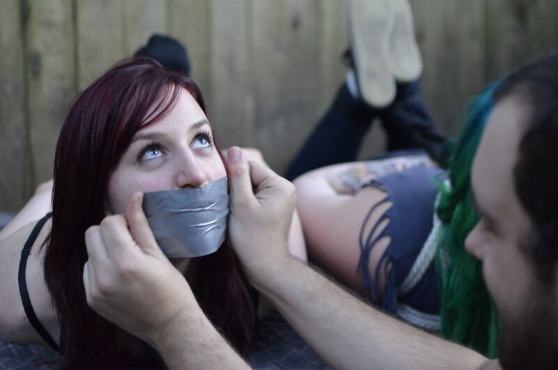 Person with tape over mouth