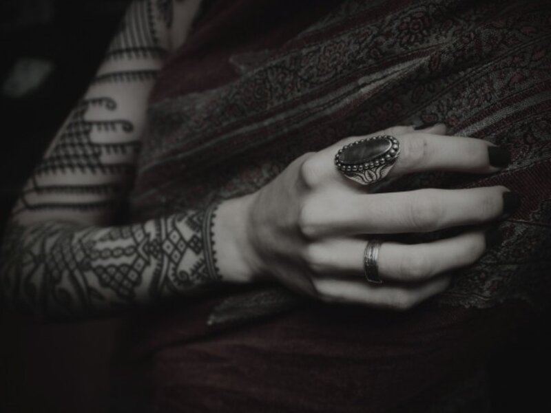 Person with Tattooed Arm