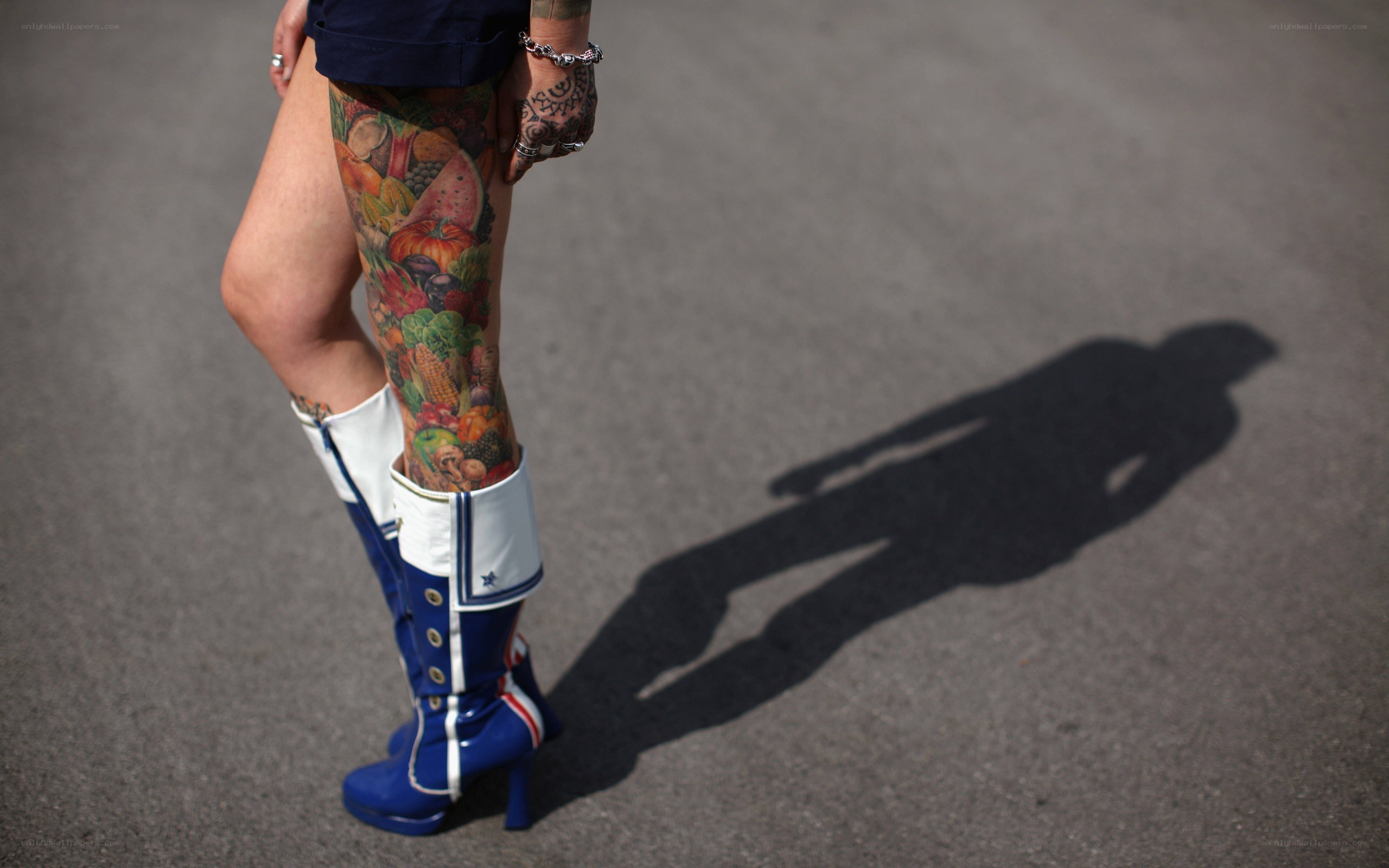 person with tattooed leg