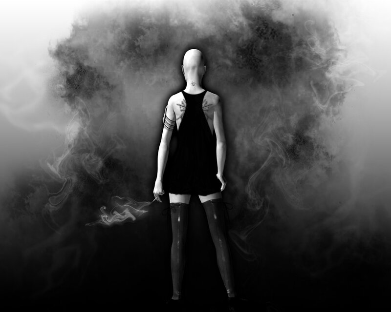 person with tattoos in smoke