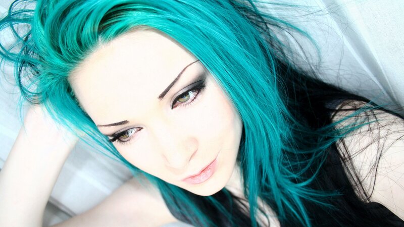 person with teal hair