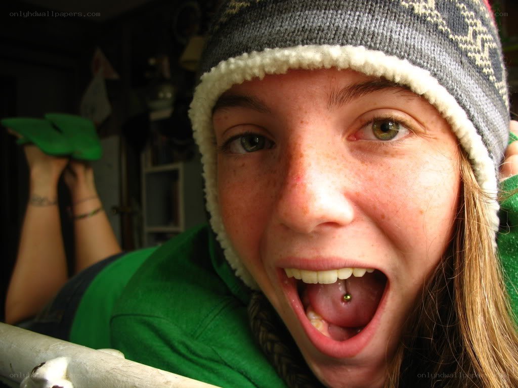 person with tongue piercing
