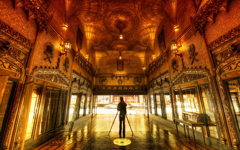 Person with Tripod in Hall