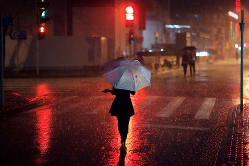 Person with Umbrella at Night
