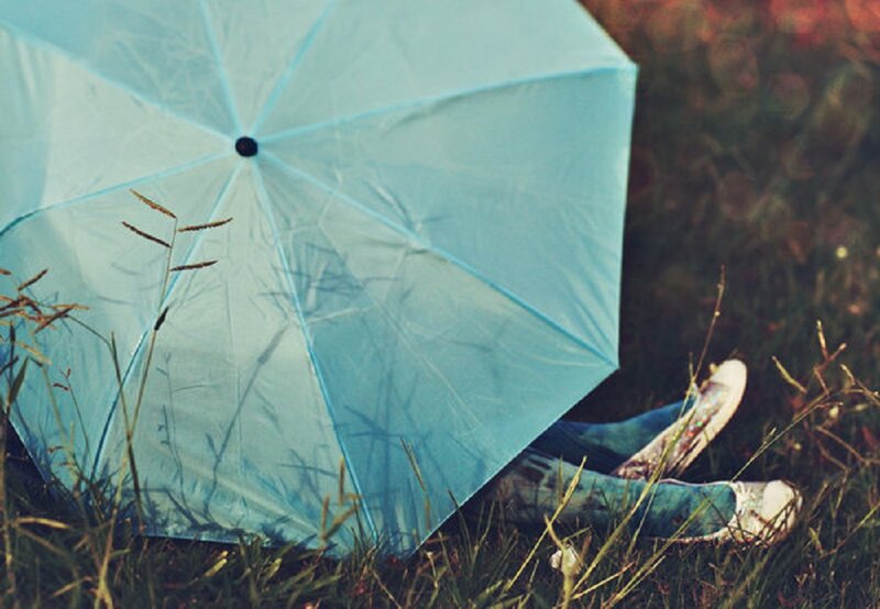 Person with Umbrella — Blue