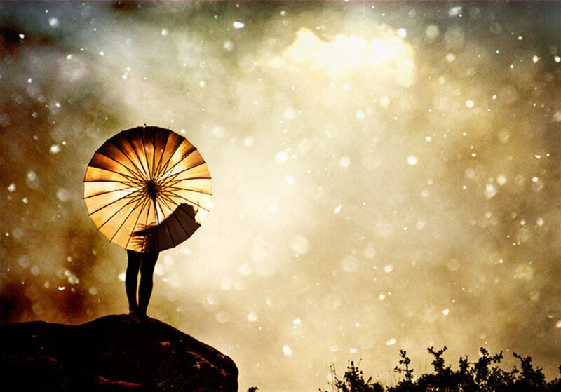 Person with Umbrella — Gold