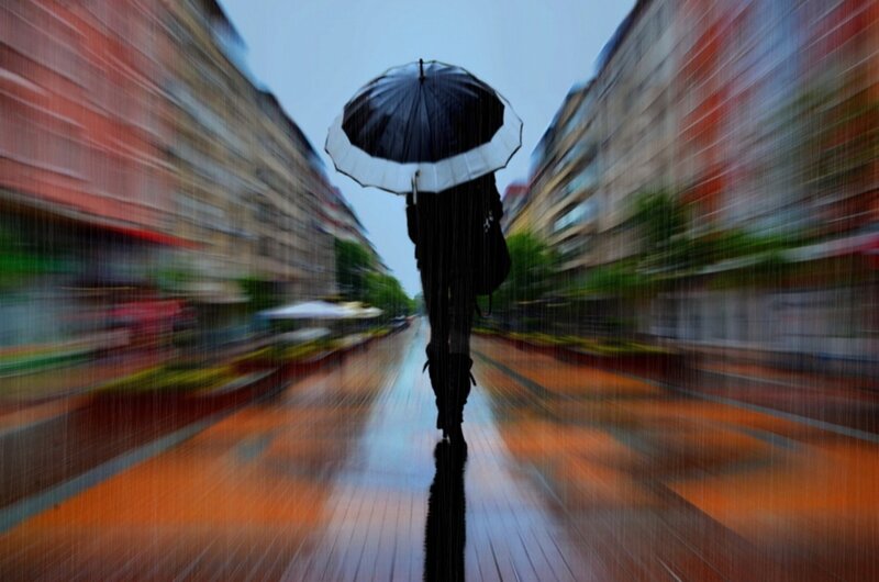 Person with Umbrella in Rain — Black, Dramatic, Afternoon