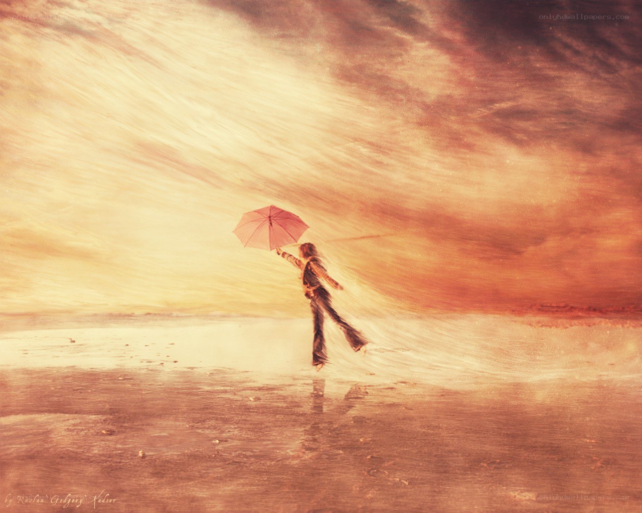 person with umbrella on beach