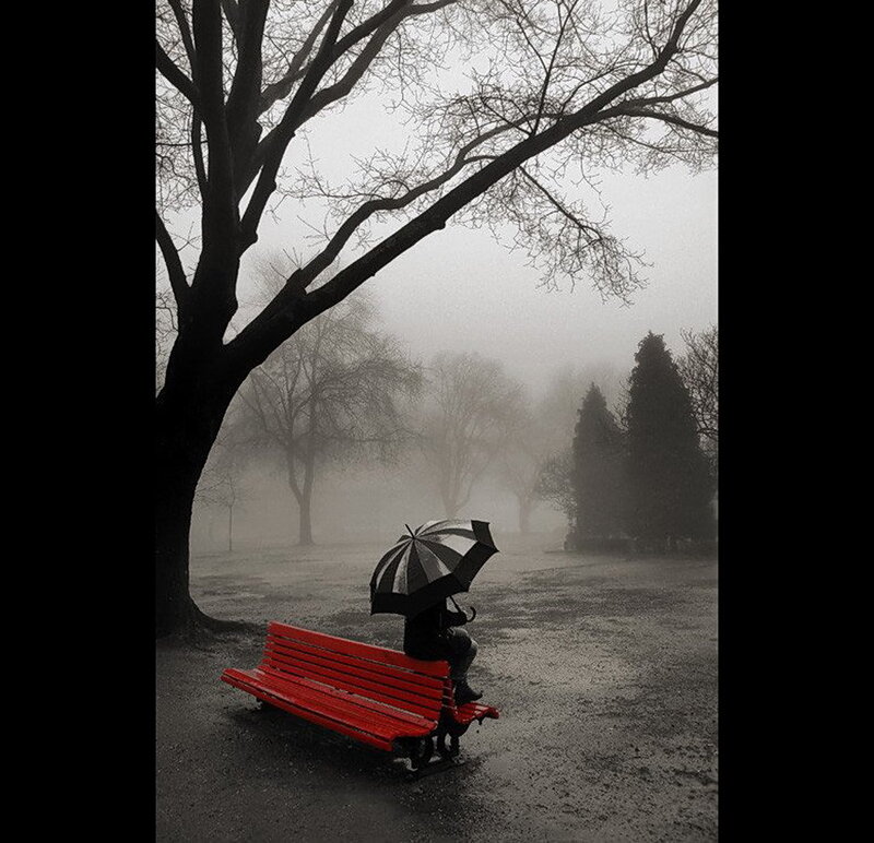 Person with Umbrella on Bench — Red, Melancholic