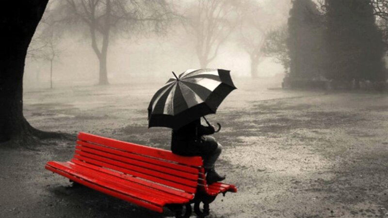 Person with Umbrella on Bench — Red, Melancholic, Winter, Photograph