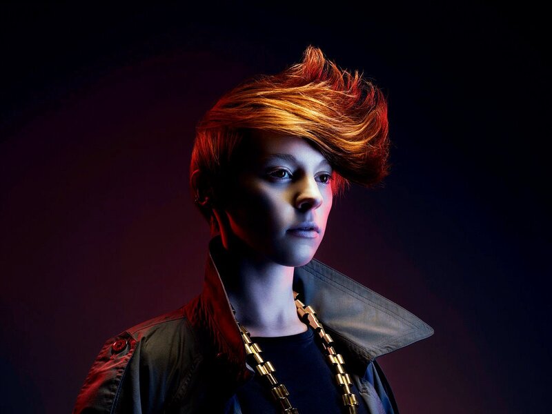 person with vibrant red hair