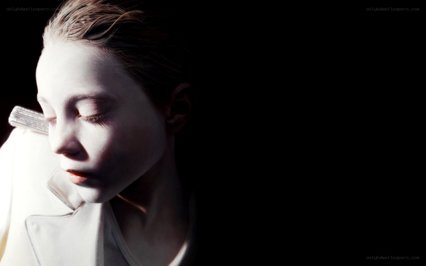 person with white face paint