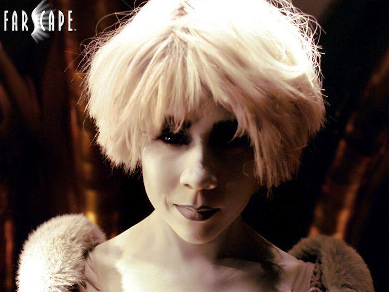 person with white hair and makeup