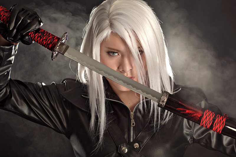 person with white hair holding sword