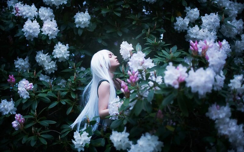 Person with White Hair — Serene, Photograph, Flowers