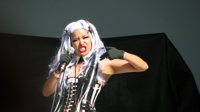 Person with White Hair Singing
