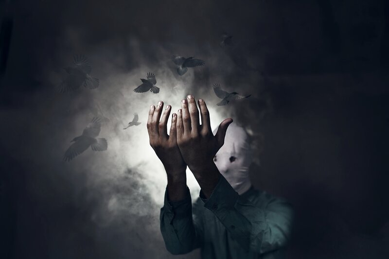 Person with White Mask
