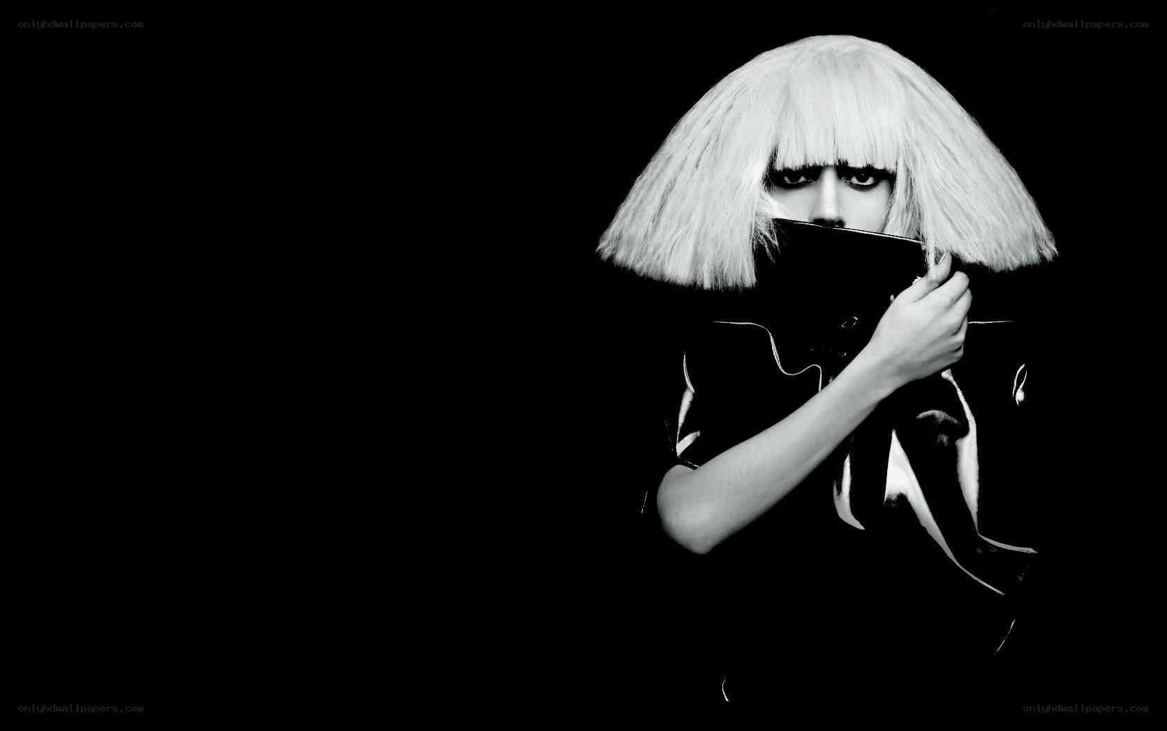 person with white wig holding object