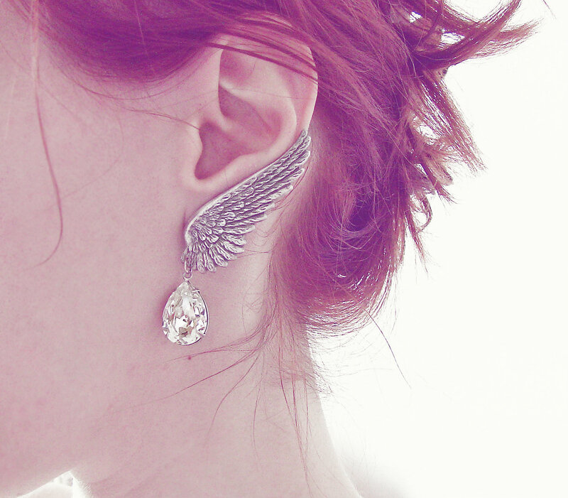 Person with Wing Earring
