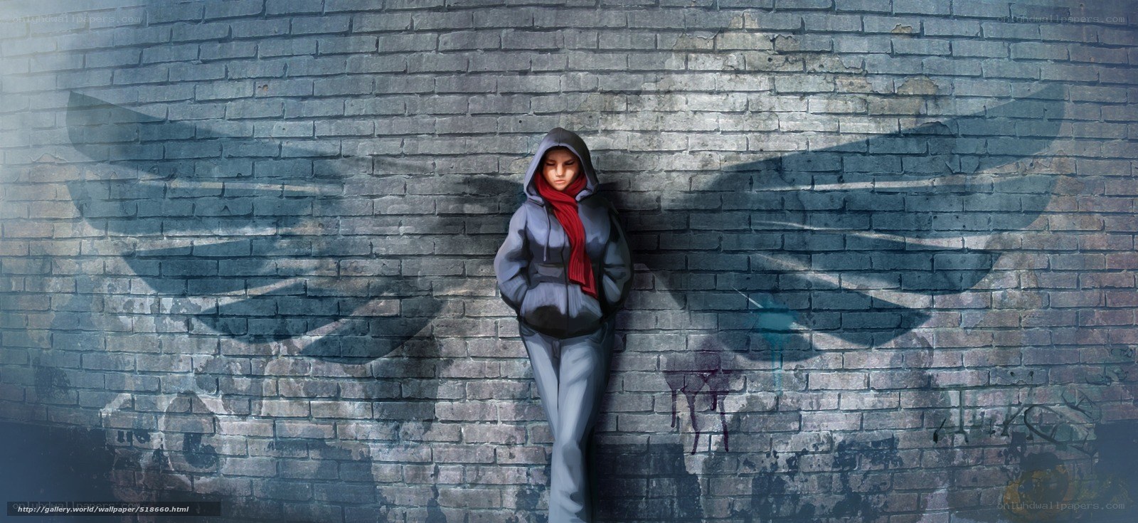person with wings on brick wall
