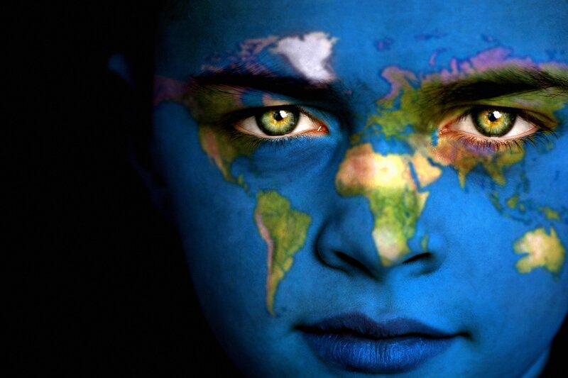 Person with World Map Face Paint — Blue