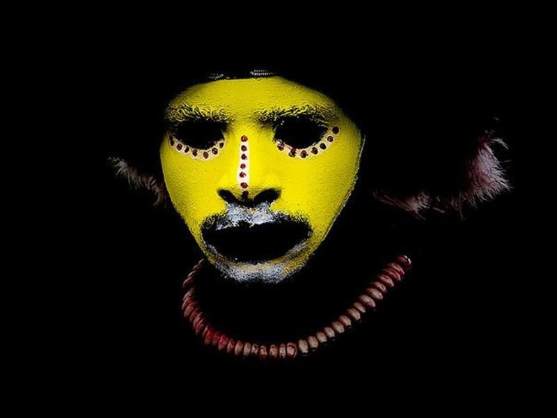 Person with Yellow Face Paint