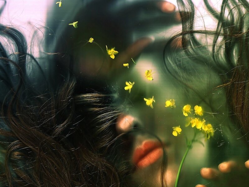 Person with Yellow Flowers