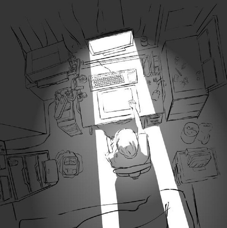 person working at desk from above
