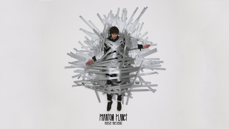 person wrapped in silver tape