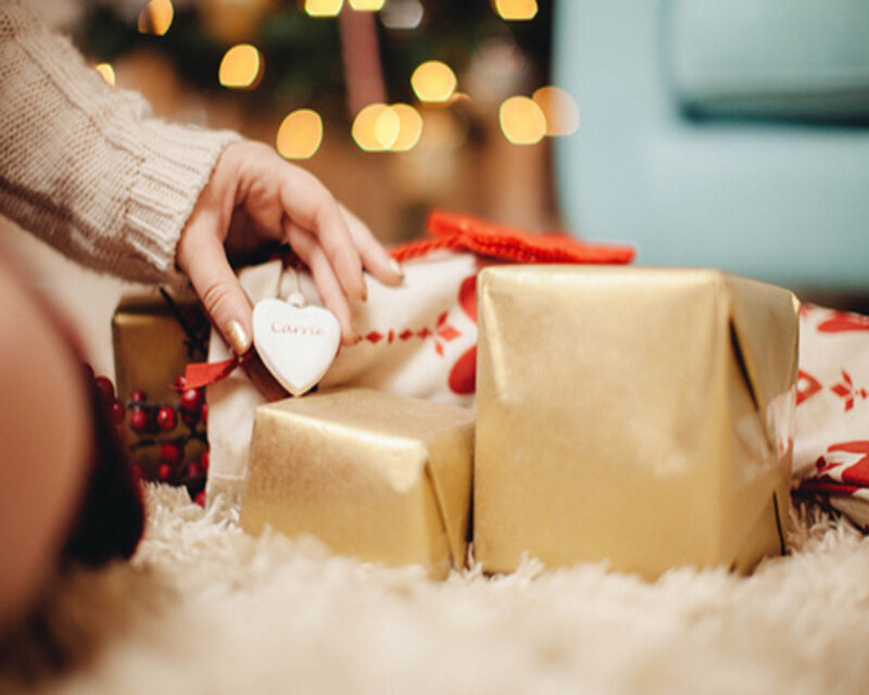 Person Wrapping Gifts