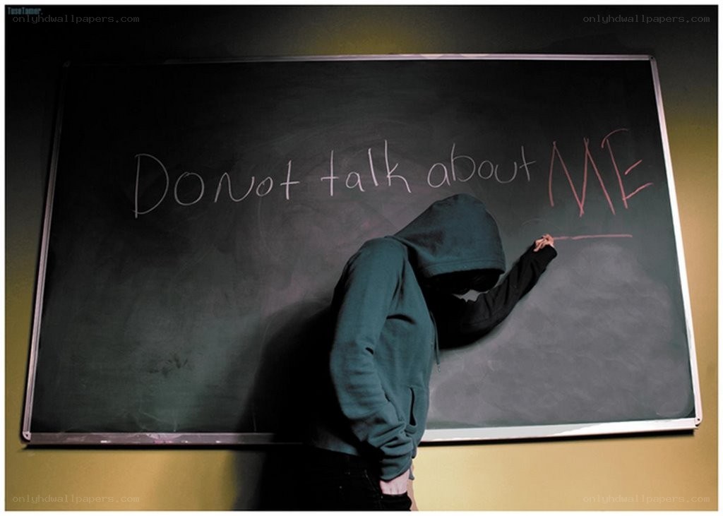 person writing on chalkboard