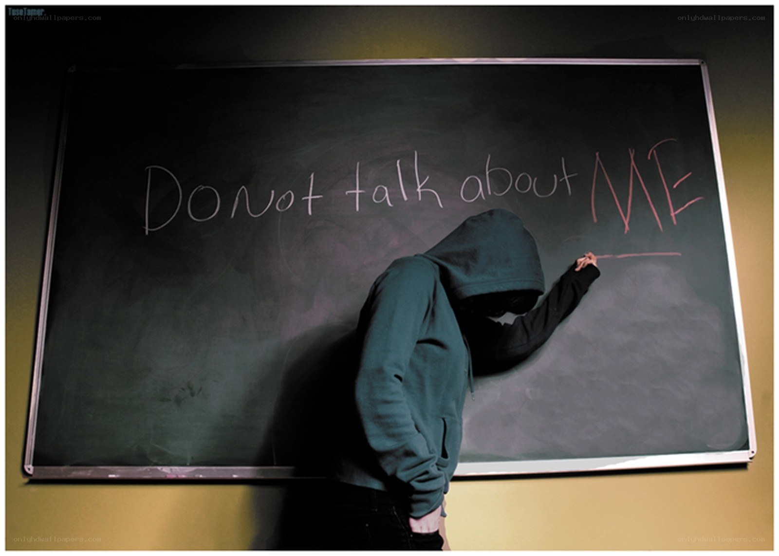 person writing on chalkboard