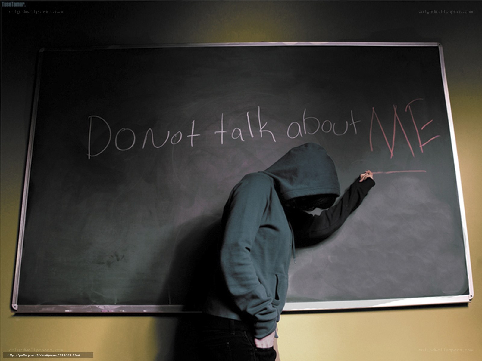 person writing on chalkboard