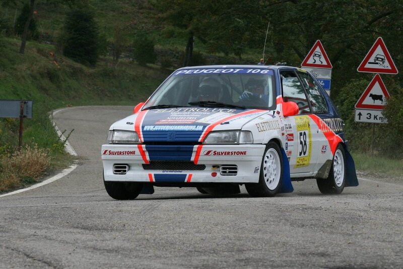 Peugeot 106 rally car on road
