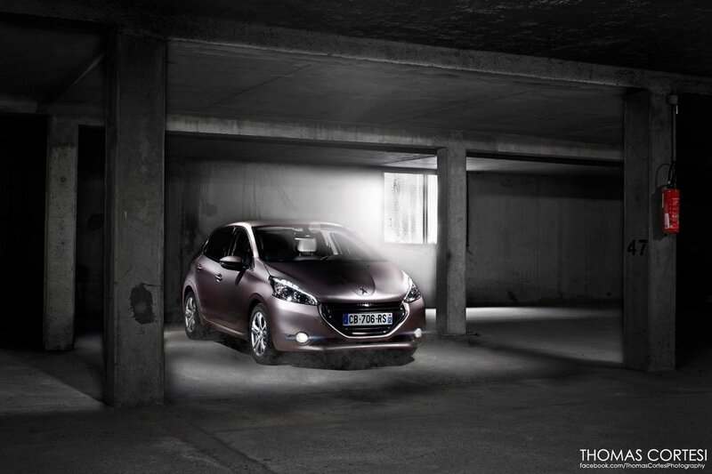 Peugeot 208 in parking garage