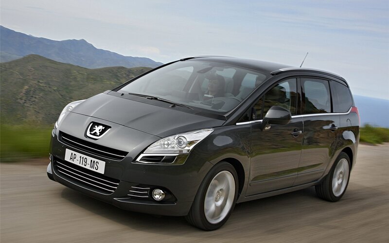 Peugeot 5008 driving on a road