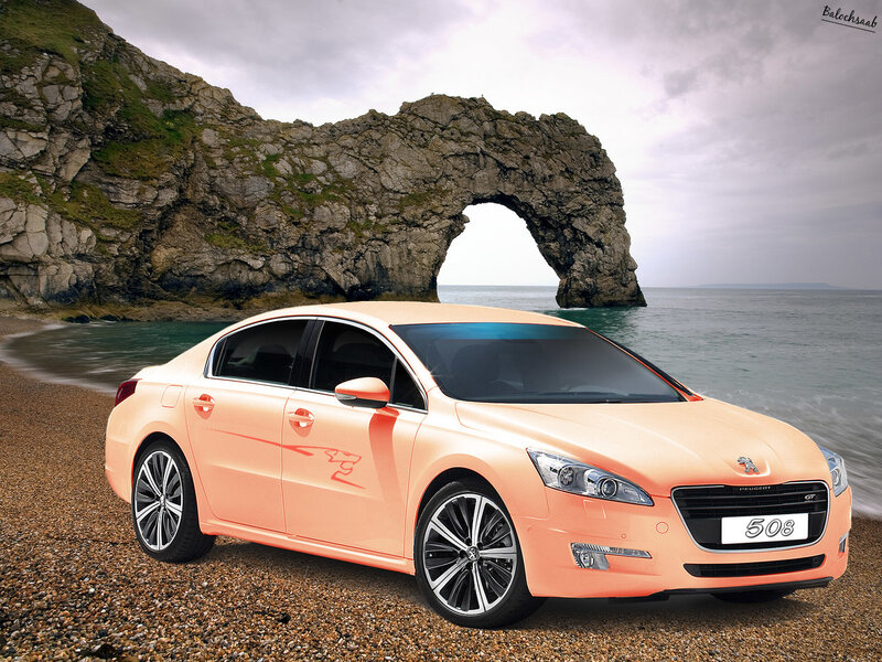 Peugeot 508 on a pebble beach