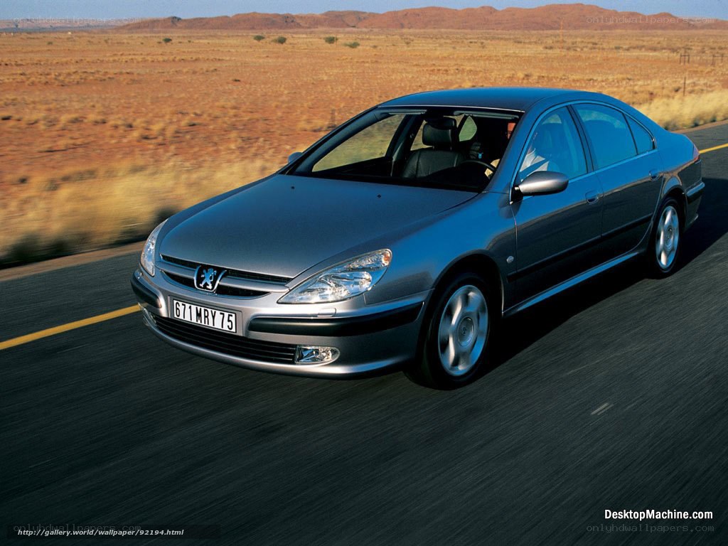 Peugeot 607 on desert road