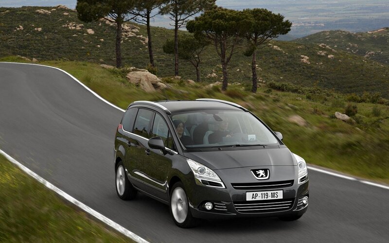 Peugeot driving on a winding road