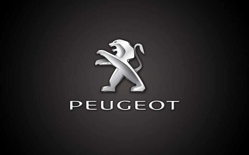 Peugeot logo on dark background