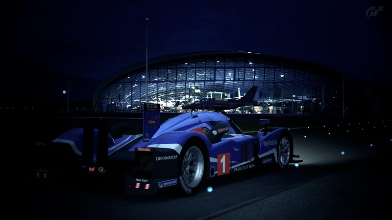 Peugeot race car at night