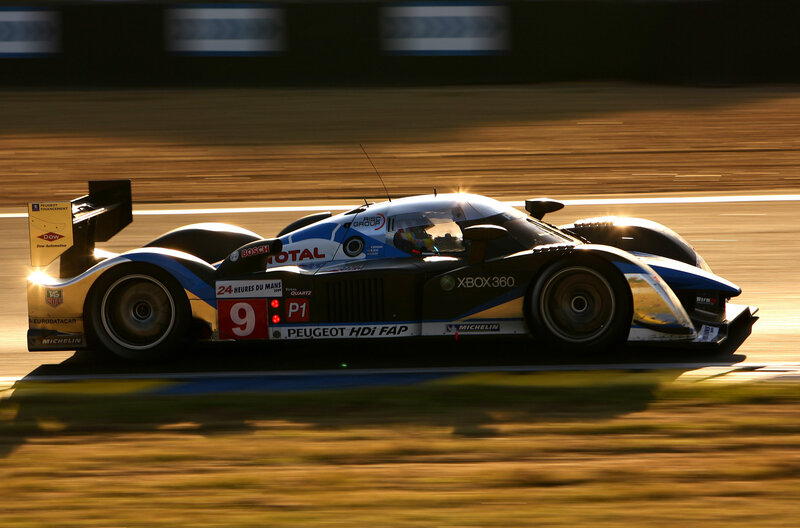 Peugeot race car at night