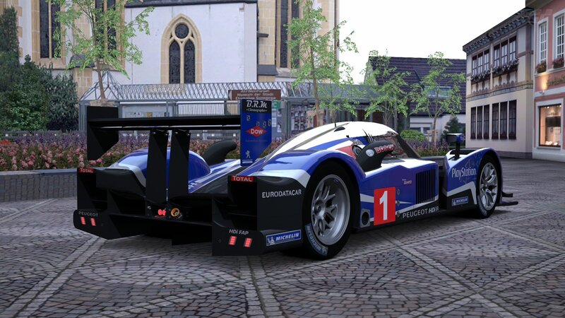 Peugeot race car on cobblestones