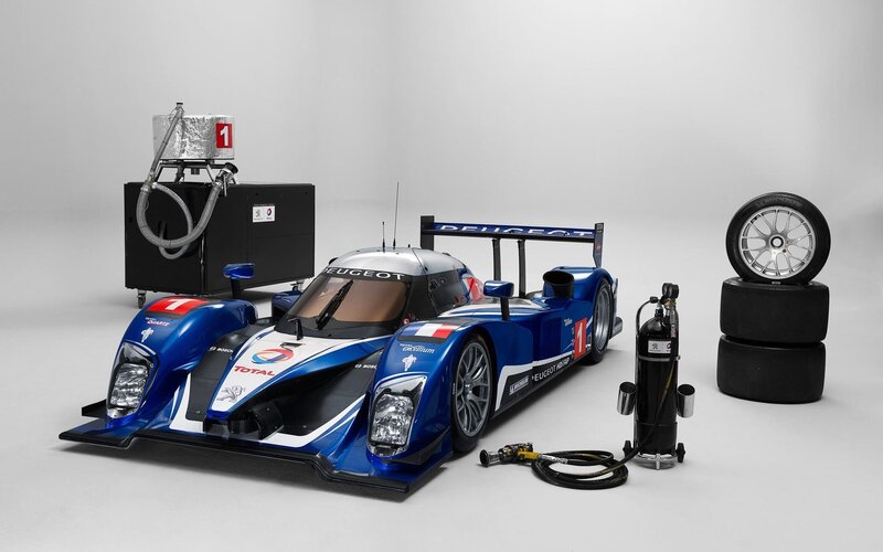 Peugeot race car with pit equipment