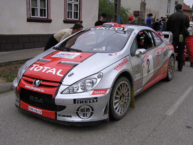 Peugeot rally car on street