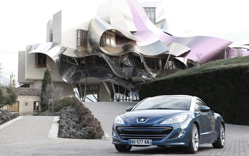 Peugeot RCZ in front of Gaudi building