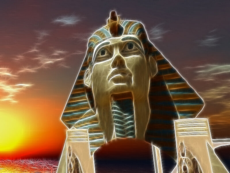 Pharaoh statue at sunset