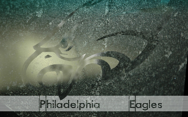 Philadelphia Eagles logo on glass