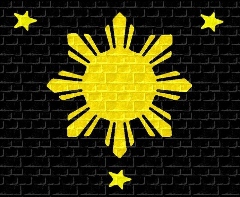 Philippine flag on brick wall