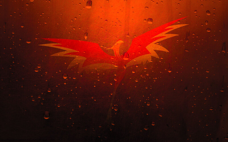 Phoenix logo on rainy glass